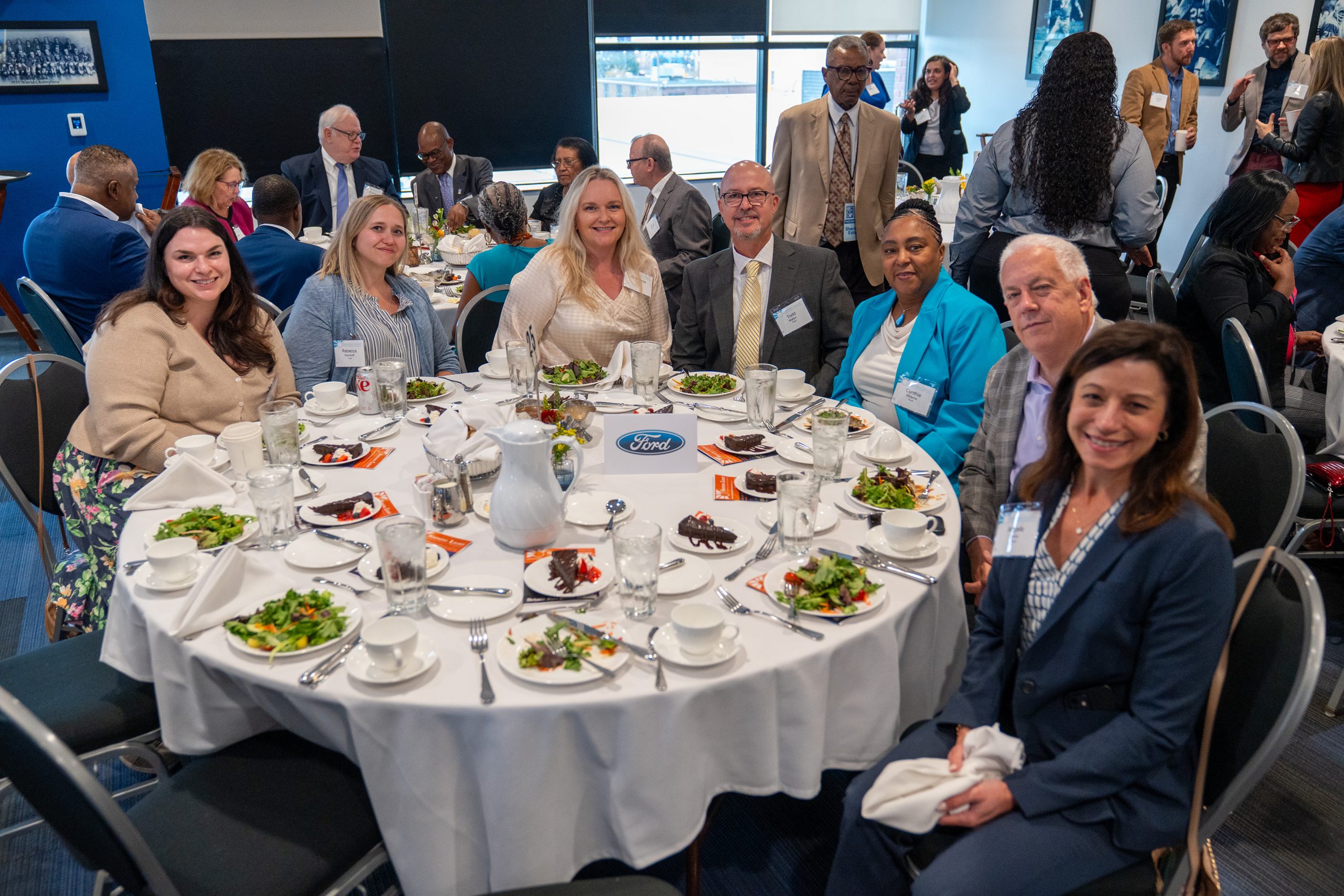 Images from the 2025 SEMCOG Shining Light Awards ceremony, showcasing honorees receiving recognition for outstanding regional cooperation and leadership. The photos feature award recipients posing with plaques, speakers addressing the audience, and attendees gathered in a formal event setting with branded banners and sponsor logos in the background.