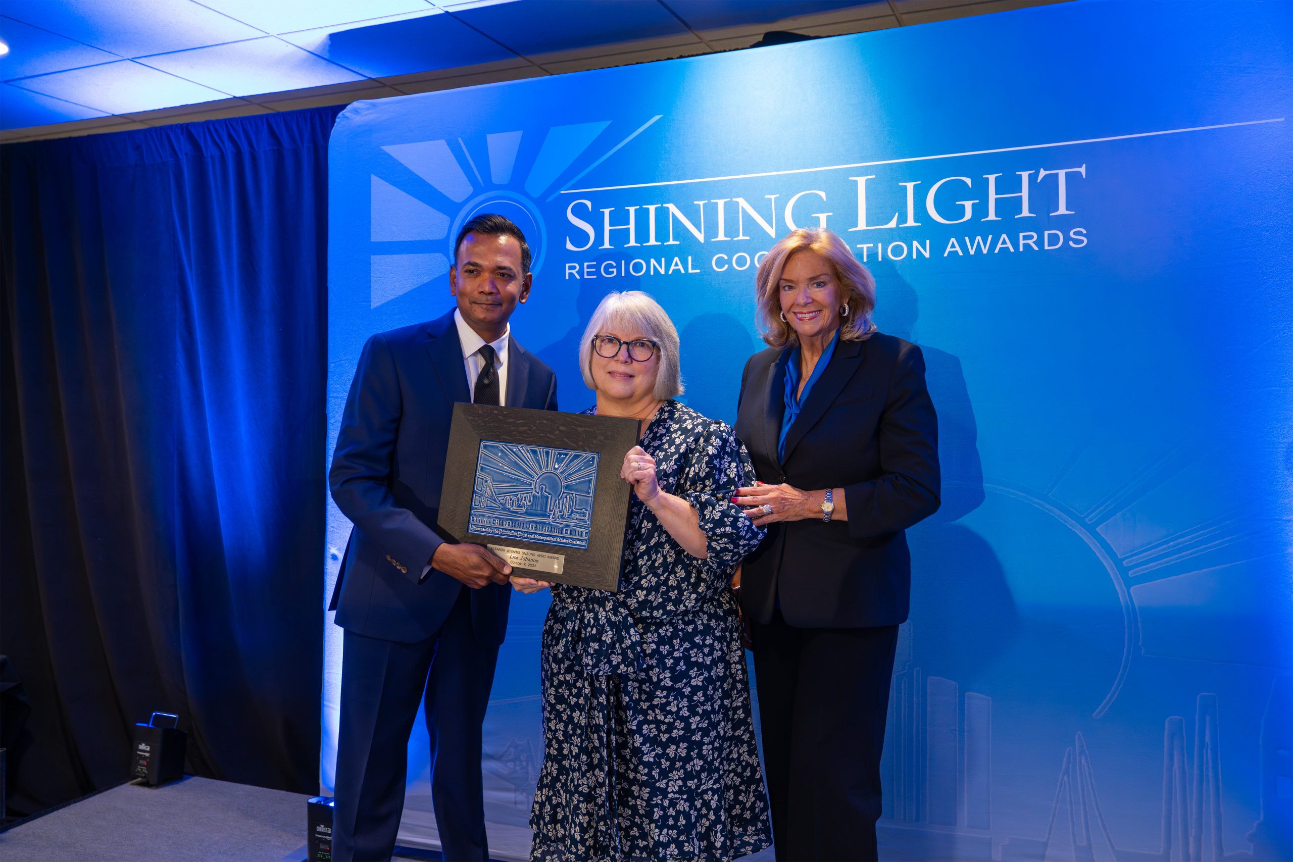 Images from the 2025 SEMCOG Shining Light Awards ceremony, showcasing honorees receiving recognition for outstanding regional cooperation and leadership. The photos feature award recipients posing with plaques, speakers addressing the audience, and attendees gathered in a formal event setting with branded banners and sponsor logos in the background.