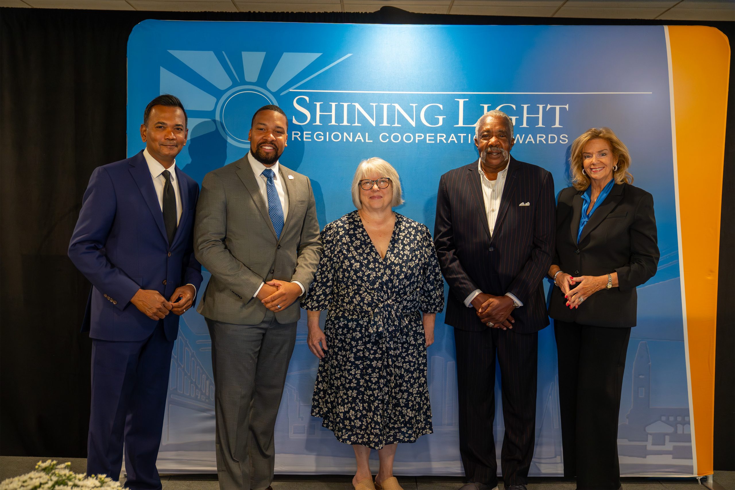 Diversity of professionals at the Shining Light Regional Cooperative Awards event, showcasing leadership and excellence in regional collaboration.