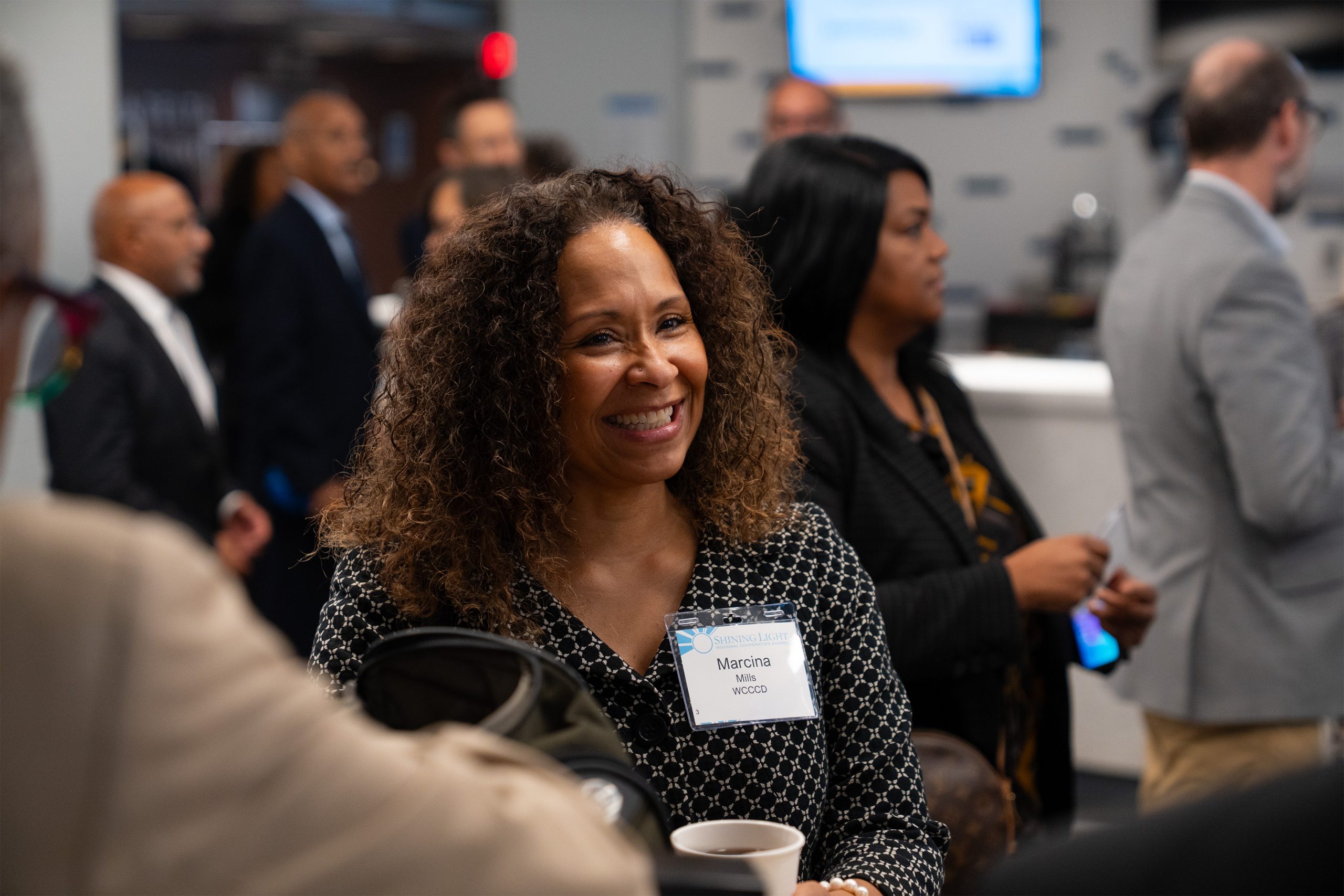 Empowering women in the community at the Shining Light Awards event, showcasing diversity, leadership, and recognition for outstanding contributions in the nonprofit and community service sectors.